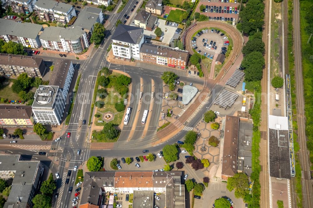 Dinslaken from above - Track and railway station of the German railway next to the circle of a tram Am Bahnhofspl. In Dinslaken in North Rhine-Westphalia - NRW, Germany