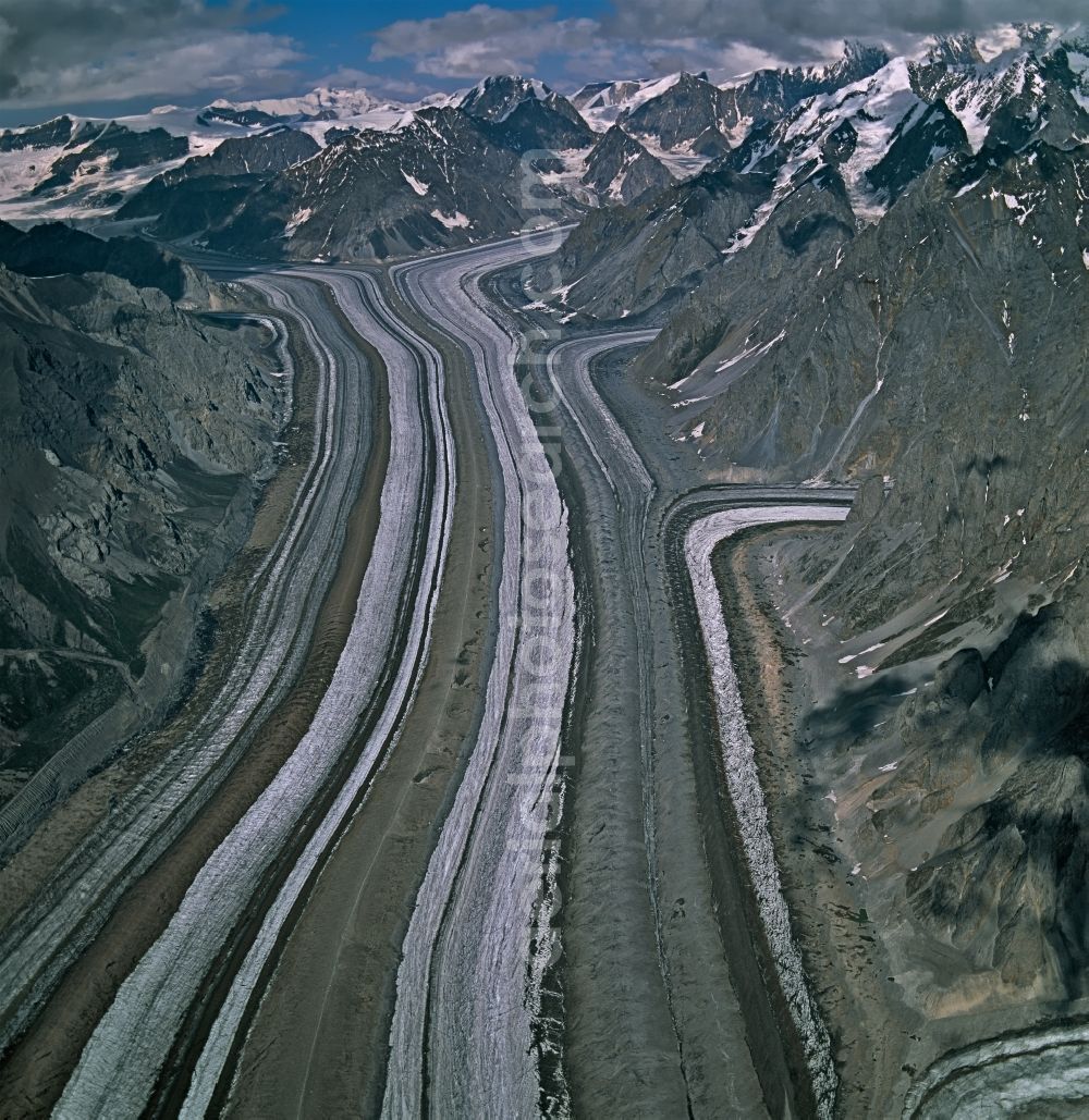 Aerial image Chitina - Barnard Glacier in the rock and mountain landscape in Chitina in Alaska, United States of America