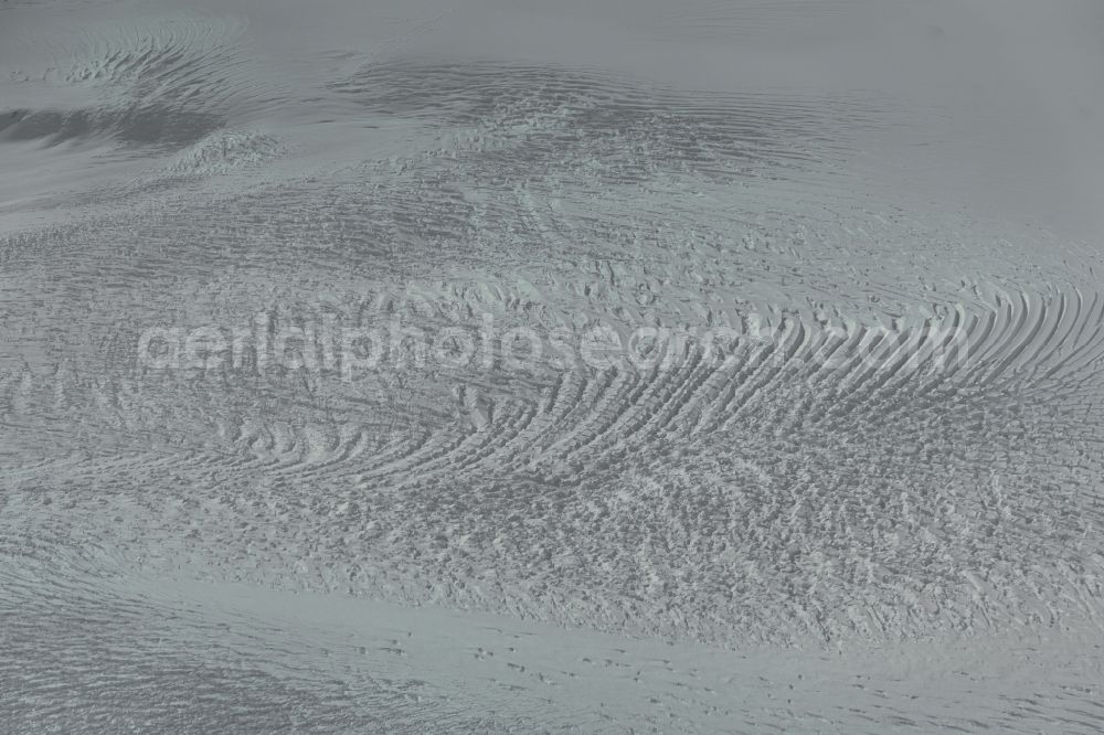 Aerial image Greenland - White, snowy ice glacial landscape Greenland in in Kommuneqarfik Sermersooq, Greenland