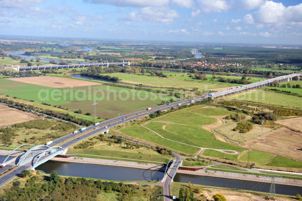 Aerial photograph Magdeburg - Blick auf die Glindenberger Brücke B40 über den Rothenseer Verbindungskanal in Magdeburg und die Autobahn A2 sowie die Kanalbrücke über die Elbe in Sachsen-Anhalt. Ein Projekt des WSV, Wasser- und Schifffahrtsverwaltung des Bundes. Bridge over the Drop-Canal Rothensee in Magdeburg, the motorway A 2 and the canal bridge over the Elbe river in Saxony-Anhalt.