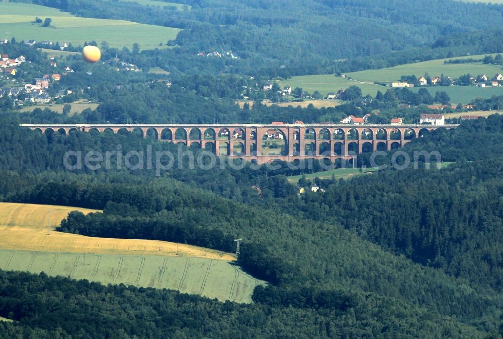 Netzschkau from above - The Goeltzschtal-bridge is a railroad bridge that crosses the Goeltzsch valley between the villages of Mylau and Netzschkau in Saxony. The viaduct is the largest brick bridge in the world. The arch bridge of the oldest historical buildings in railway history in Germany. The design and calculation of the statics of the bridge gave Johann Andreas Schubert (1808-1870)
