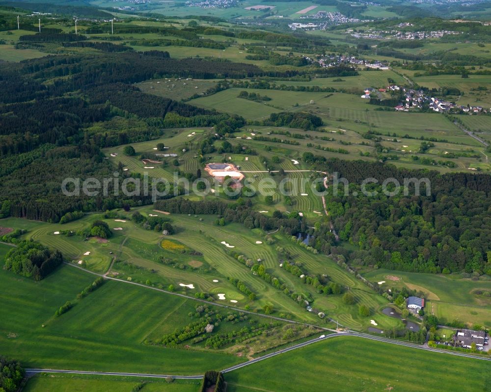 Dreifelden from above - Golfclub Westerwald in Dreifelden in the state of Rhineland-Palatinate. The borough and municipiality Dreifelden is located in the county district of Westerwaldkreis, on the lake Dreifelder Weiher and is an official tourist resort. Dreifelden is also home of the Golfclub Westerwald in the North of the borough