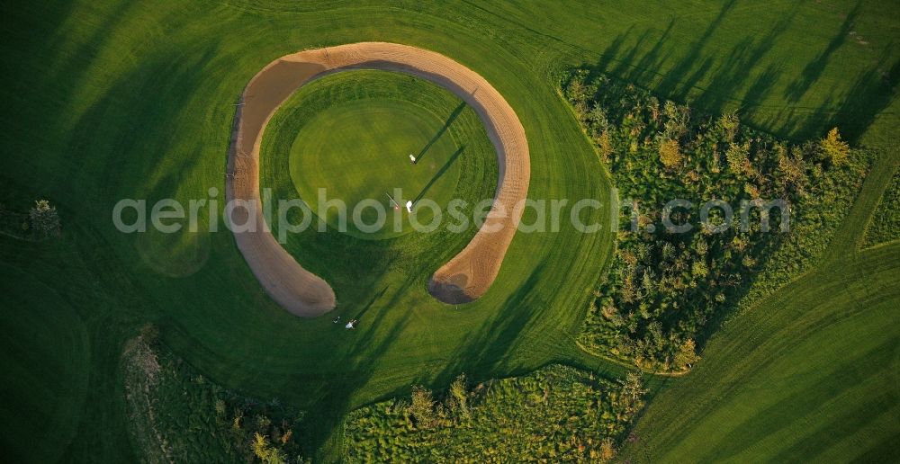 Datteln from the bird's eye view: Golf course Jammertal with c-shaped bunker of the Schnieder e.K. in Datteln in North Rhine-Westphalia