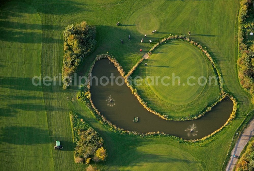 Aerial photograph Datteln - Golf course Jammertal with pond of the Schnieder e.K. in Datteln in North Rhine-Westphalia