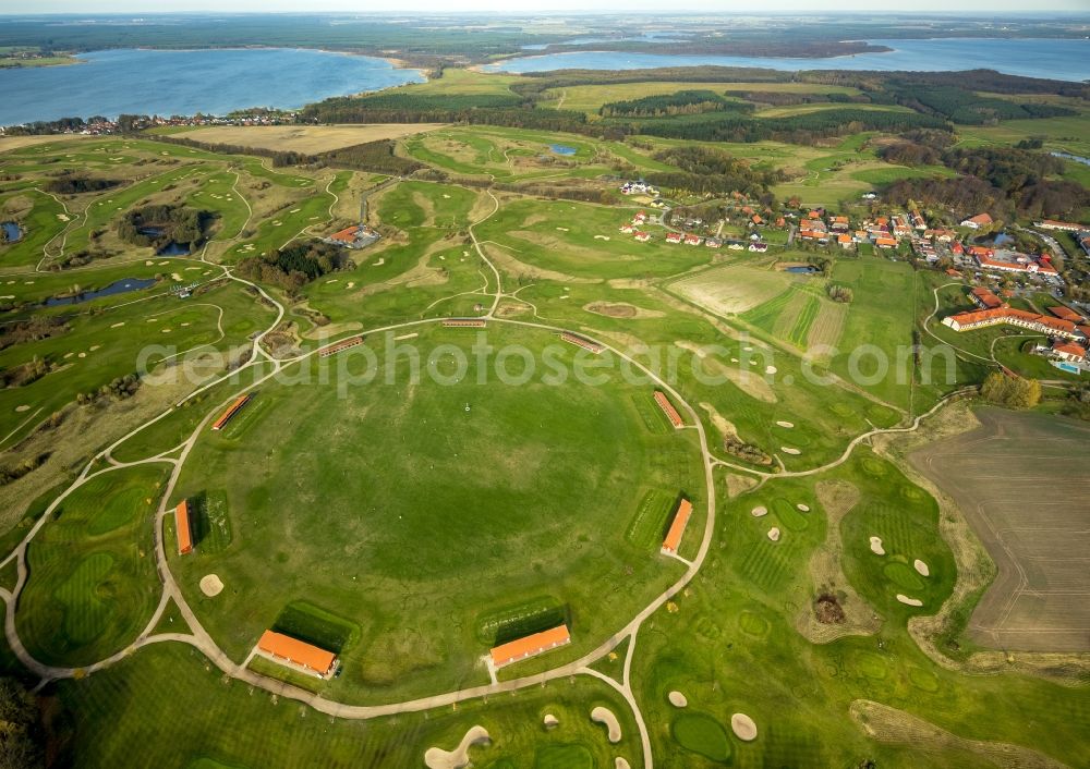 Aerial image Göhren-Lebbin - The golfing facilities and the golf club in the borough of Göhren-Lebbin on lake Fleesensee in the state of Mecklenburg-Vorpommern. The borough is a renowned climatic spa with a local golf club consisting of 5 different courses and over 70 holes. There is also a round golf arena for training. The landscape is informed by the region of the Mecklenburg lake district