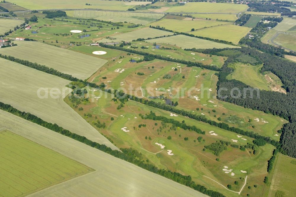 Groß Kienitz from the bird's eye view: View the golf course Great Kienitz southeast of the airport BER Construction. Pictured are on the occasion of the Lufthansa Airlines media Cup placed logos