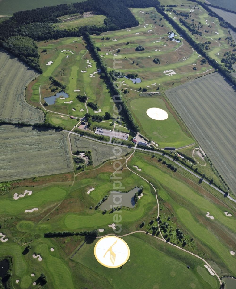 Groß Kienitz from above - View the golf course Great Kienitz southeast of the airport BER Construction. Pictured are on the occasion of the Lufthansa Airlines media Cup placed logos