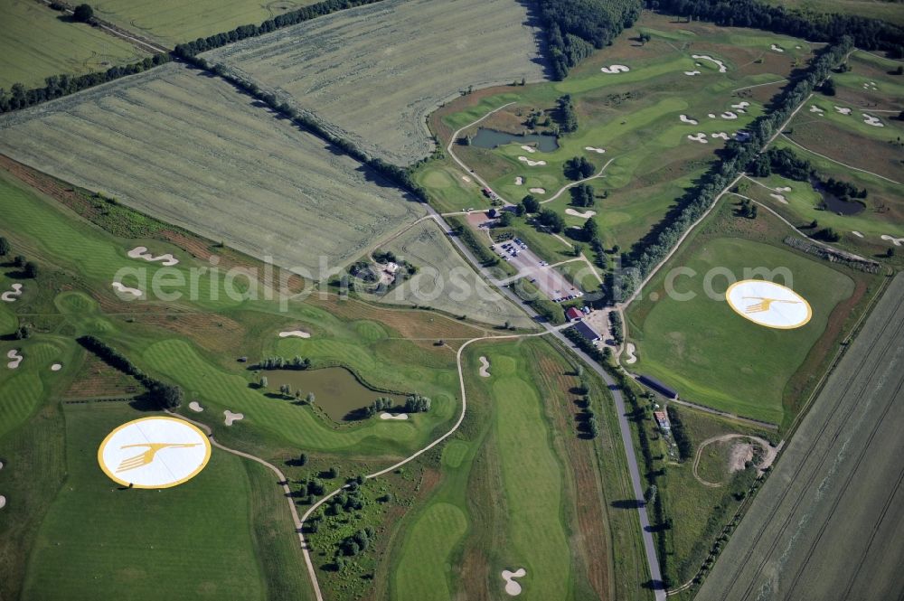 Groß Kienitz from the bird's eye view: View the golf course Great Kienitz southeast of the airport BER Construction. Pictured are on the occasion of the Lufthansa Airlines media Cup placed logos