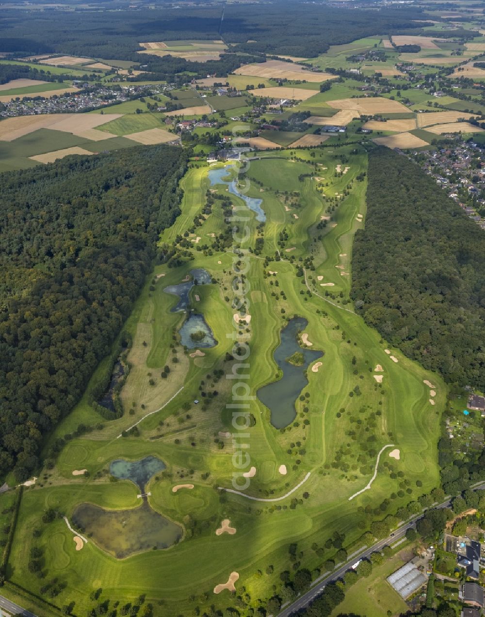 Aerial image Kamp-Lintfort - The golf course of the Golfclub Am Kloster-Kamp e.V. in Kamp-Lintfort in the state North Rhine-Westphalia. The shadows of the clouds are visible on the course