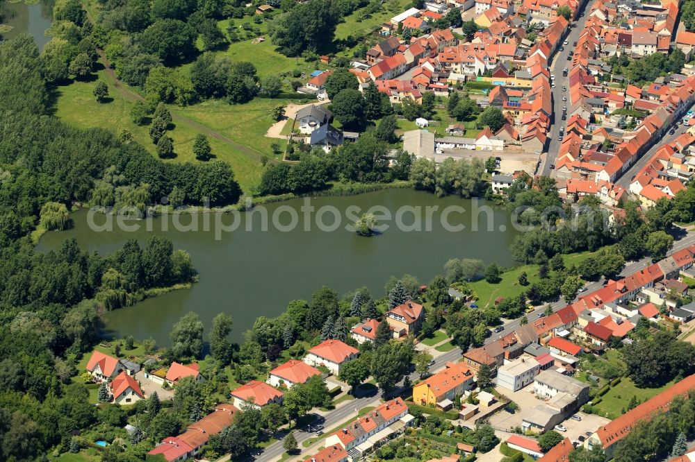 Sömmerda from above - The Gondel lake is between the Breitscheidstrasse and the Erfurter Strasse in Soemmerda in Thuringia. This lake in the south of the city is supplied with water from the Unstrut and now serves as a fishing area. The Gondelteich is fishing club waters of the association Unstrut 90 eV