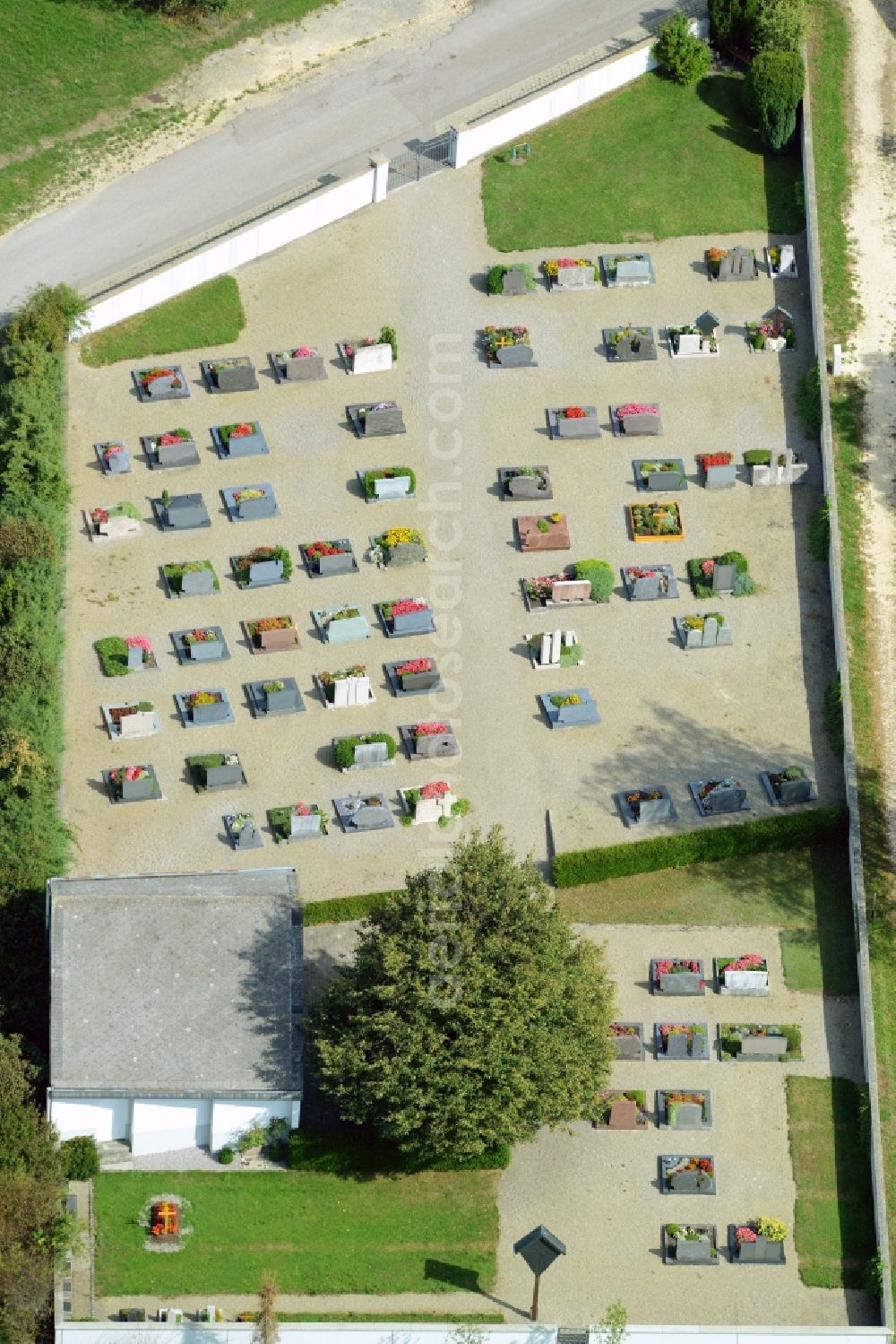 Dischingen from above - Grave rows on the grounds of the cemetery in the Demmingen part of Dischingen in the state of Baden-Wuerttemberg