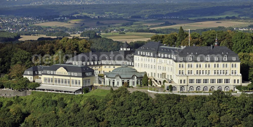 Aerial image Königswinter - Blick auf das ehemalige Gästehaus der Bundesregierung auf dem Petersberg bei Bonn. Bis 1952 war hier der Sitz der Alliierten Hohen Kommission. Von 1955 bis 1969 und wieder seit 1990 dient das Grandhotel auf dem Petersberg als Gästehaus der Bundesrepublik Deutschland, das in unregelmäßigem Abstand Stätte von nationalen wie internationalen Konferenzen wurde. Das Hotel wird seit der Neueröffnung 1990 von der Steigenberger-Kette betrieben. Alleineigentümer ist weiterhin der Bund. View of the former government guest house on the Petersberg near Bonn. Until 1952 it was the seat of the Allied High Commission.