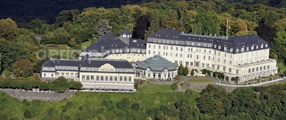 Aerial photograph Königswinter - Blick auf das ehemalige Gästehaus der Bundesregierung auf dem Petersberg bei Bonn. Bis 1952 war hier der Sitz der Alliierten Hohen Kommission. Von 1955 bis 1969 und wieder seit 1990 dient das Grandhotel auf dem Petersberg als Gästehaus der Bundesrepublik Deutschland, das in unregelmäßigem Abstand Stätte von nationalen wie internationalen Konferenzen wurde. Das Hotel wird seit der Neueröffnung 1990 von der Steigenberger-Kette betrieben. Alleineigentümer ist weiterhin der Bund. View of the former government guest house on the Petersberg near Bonn. Until 1952 it was the seat of the Allied High Commission.