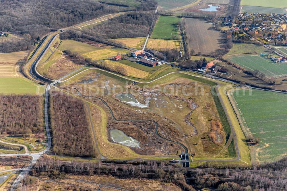 Aerial photograph Bönen - Grassland structures of a field landscape with flooding ditch in Boenen in the federal state of North Rhine-Westphalia, Germany