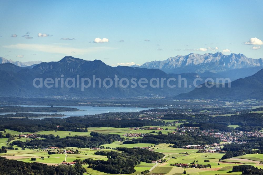 Halfing from the bird's eye view: Structures of a field landscape and Wald-Landschaft with Blick ueber den Chiemsee in die Alpen in Halfing in the state Bavaria, Germany