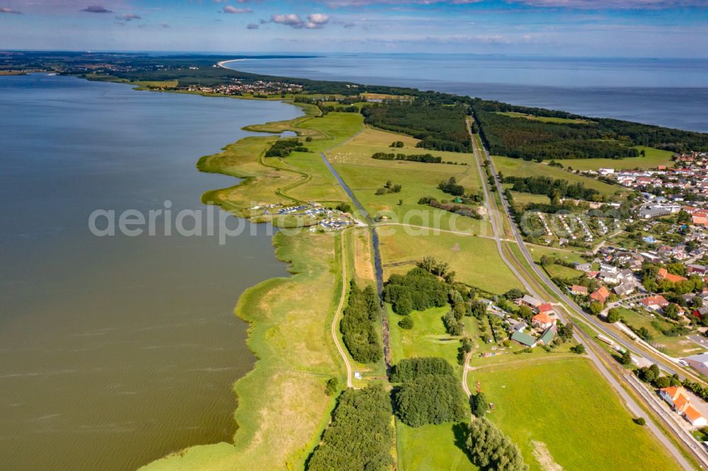 Koserow from above - Grassland structures of a field and meadow landscape between Achterwasser and the Baltic Sea coast on Achterstrasse in Koserow on the island of Usedom in the state of Mecklenburg-Vorpommern, Germany