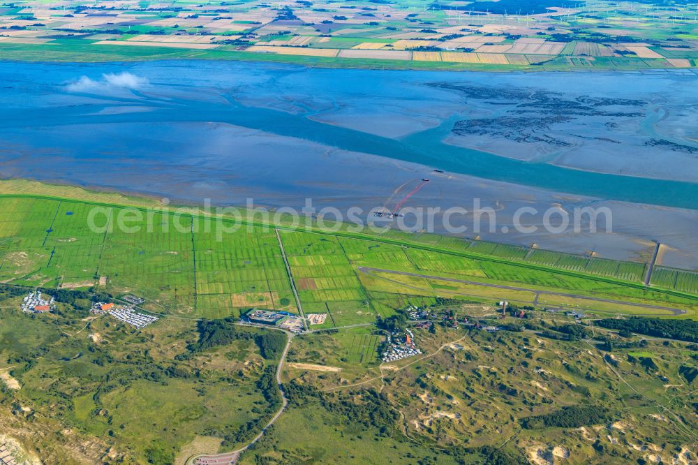 Norderney from the bird's eye view: Grassland structures of a salt marsh landscape on the south side of the island of Norderney in the state of Lower Saxony, Germanyy