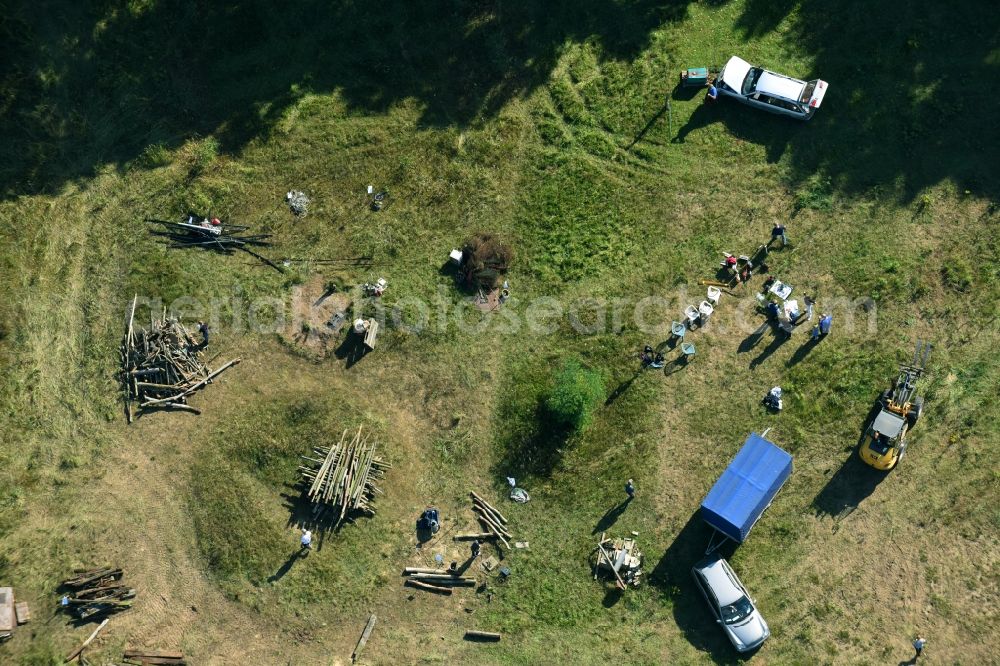 Bernau from above - Structures of a field landscape with Teilnehmern eines Lagerfeuer- Treffens in Bernau in the state Brandenburg, Germany