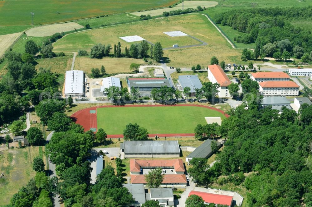 Aerial image Schwielowsee - Green-colored sports field on the grounds of the Henning von Tresckow barracks in Schwielowsee in Brandenburg, Germany