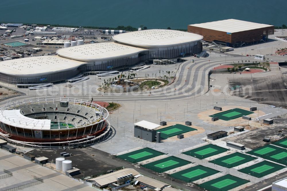 Aerial photograph Rio de Janeiro - Green colored tennis sports complex inside the Olympic Tennis Centre at the Olympic Park before the summer playing games of XXII. Olympics in Rio de Janeiro in Rio de Janeiro, Brazil