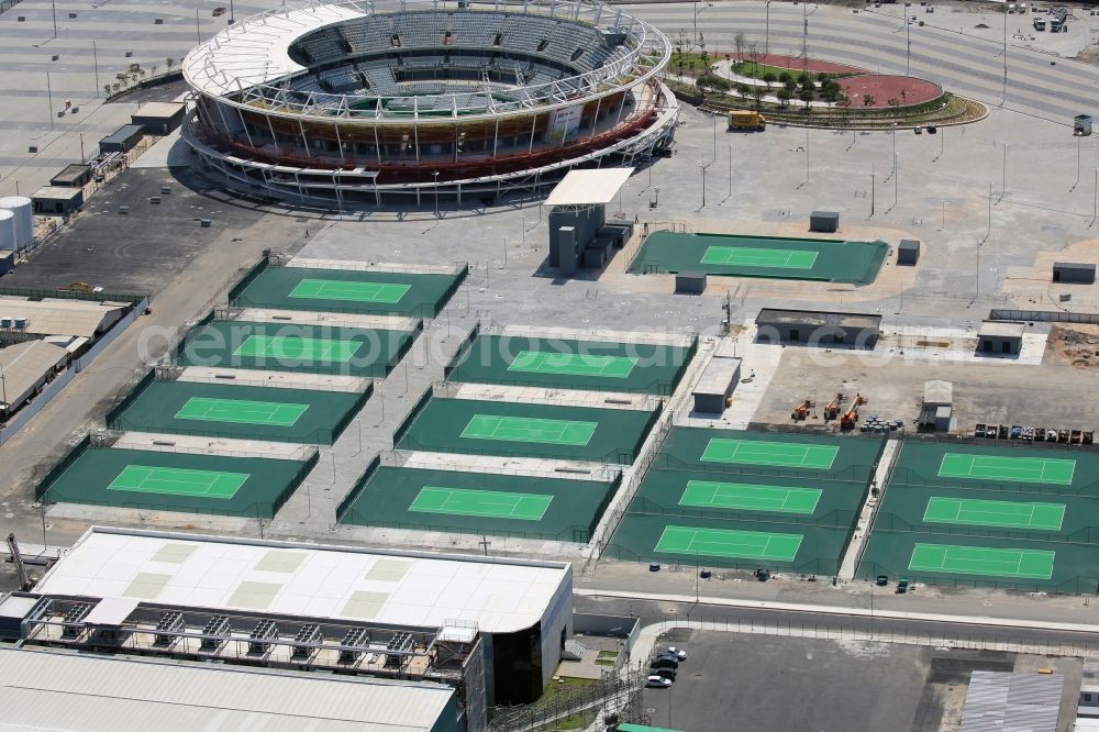 Rio de Janeiro from above - Green colored tennis sports complex inside the Olympic Tennis Centre at the Olympic Park before the summer playing games of XXII. Olympics in Rio de Janeiro in Rio de Janeiro, Brazil