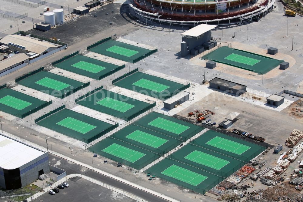 Aerial image Rio de Janeiro - Green colored tennis sports complex inside the Olympic Tennis Centre at the Olympic Park before the summer playing games of XXII. Olympics in Rio de Janeiro in Rio de Janeiro, Brazil