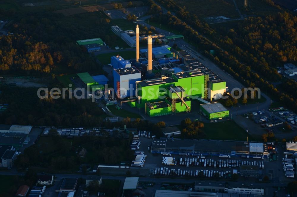 Herne from the bird's eye view: Green shimmering facade of the incinerator and thermal power station in the evening light at sunset in Herne in North Rhine-Westphalia