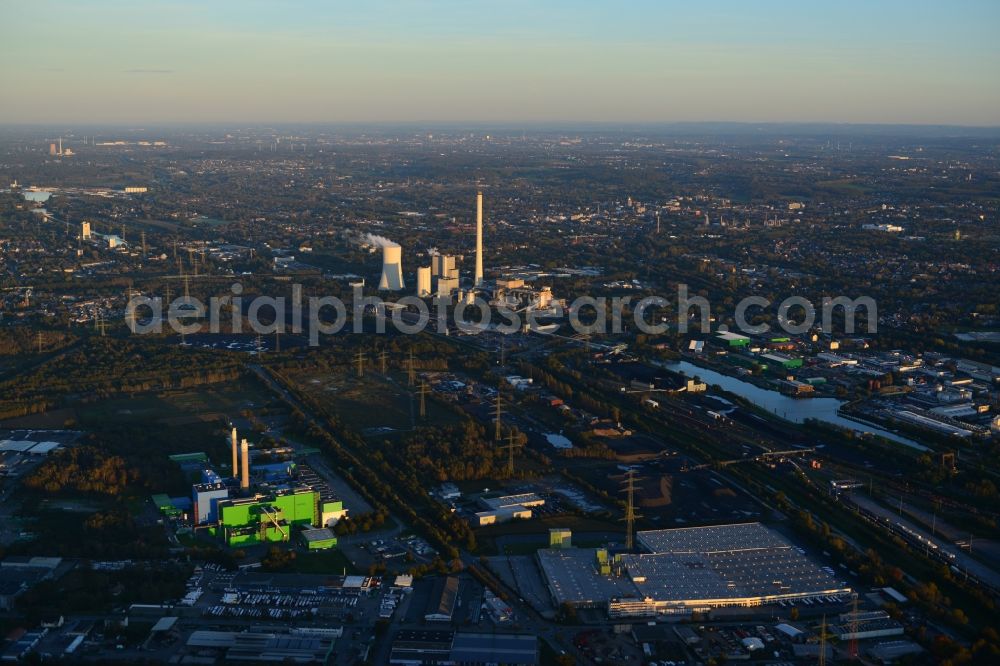 Aerial image Herne - Green shimmering facade of the incinerator and thermal power station in the evening light at sunset in Herne in North Rhine-Westphalia