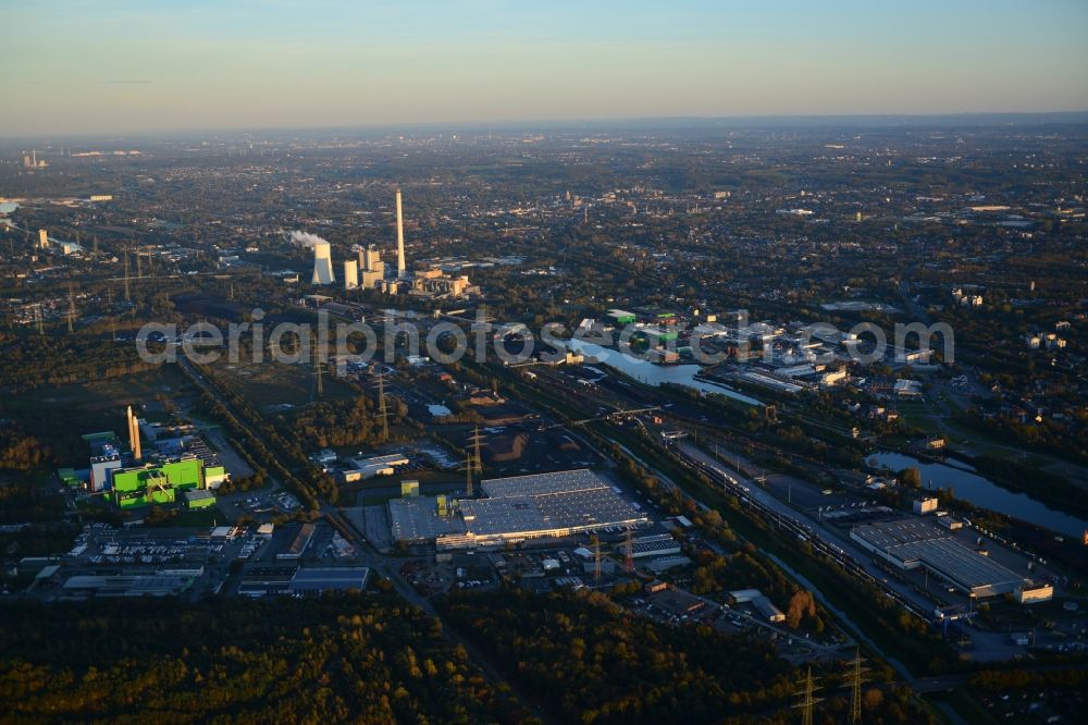 Aerial photograph Herne - Green shimmering facade of the incinerator and thermal power station in the evening light at sunset in Herne in North Rhine-Westphalia