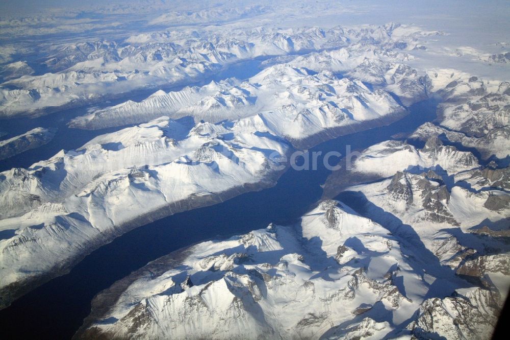 Südspitze von Grönland from above - The southern tip of Greenland with fjords, glaciers, land ice and mountain ranges