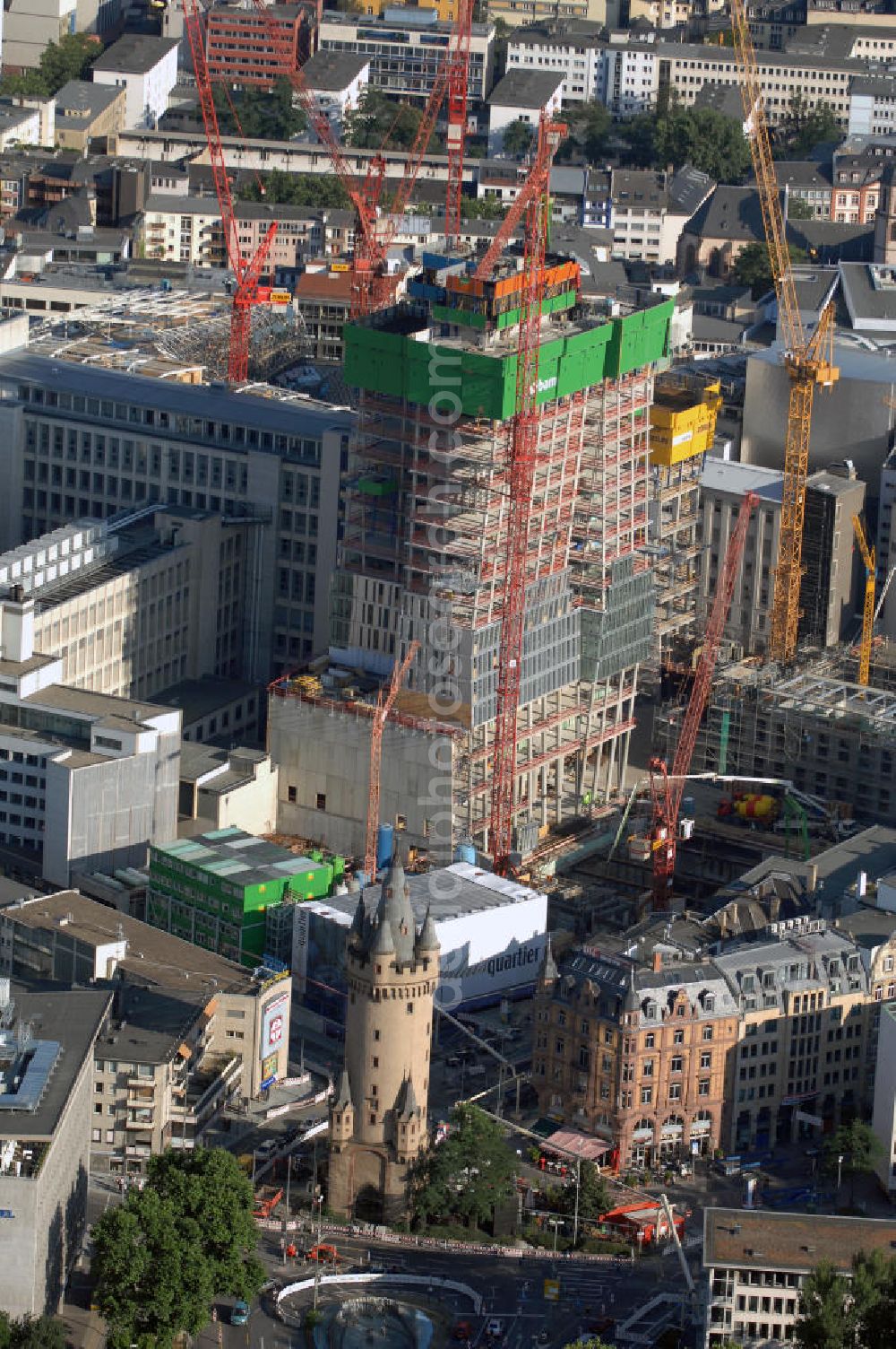 Aerial photograph Frankfurt am Main - Großbaustelle vom Bauprojekt PalaisQuartier. Auf einer Grundstücksfläche von 17.400 qm enstehen zwei Hochhäuser ein Einkaufszentrum und ein Hotel, das nach historischem Vorbild wiedererrichtete Thurn und Taxis Palais (Schloss). Es wird eine Gesamtfläche von 226.000 qm haben und eine Tiefgarage mit 1.390 Parkplätzen. ARGE PalaisQuartier: Dreßler Bau GmbH, Müllerstraße 26, 63741 Aschaffenburg, Tel. 06021 403 0, Fax 06021 403 216, E-Mail: ab-hv@dressler-bau.de; BAM Deutschland AG, Mönchhaldenstraße 26, 70191 Stuttgart, Tel. 0711 250 07 0, Fax 0711 250 07 150, E-Mail: Info@bam-deutschland.de; Ed. Züblin AG Albstadtweg 3, 70567 Stuttgart, Tel. 0711 7883 0, Fax 0711 7883 390, E-Mail: info@zueblin.de