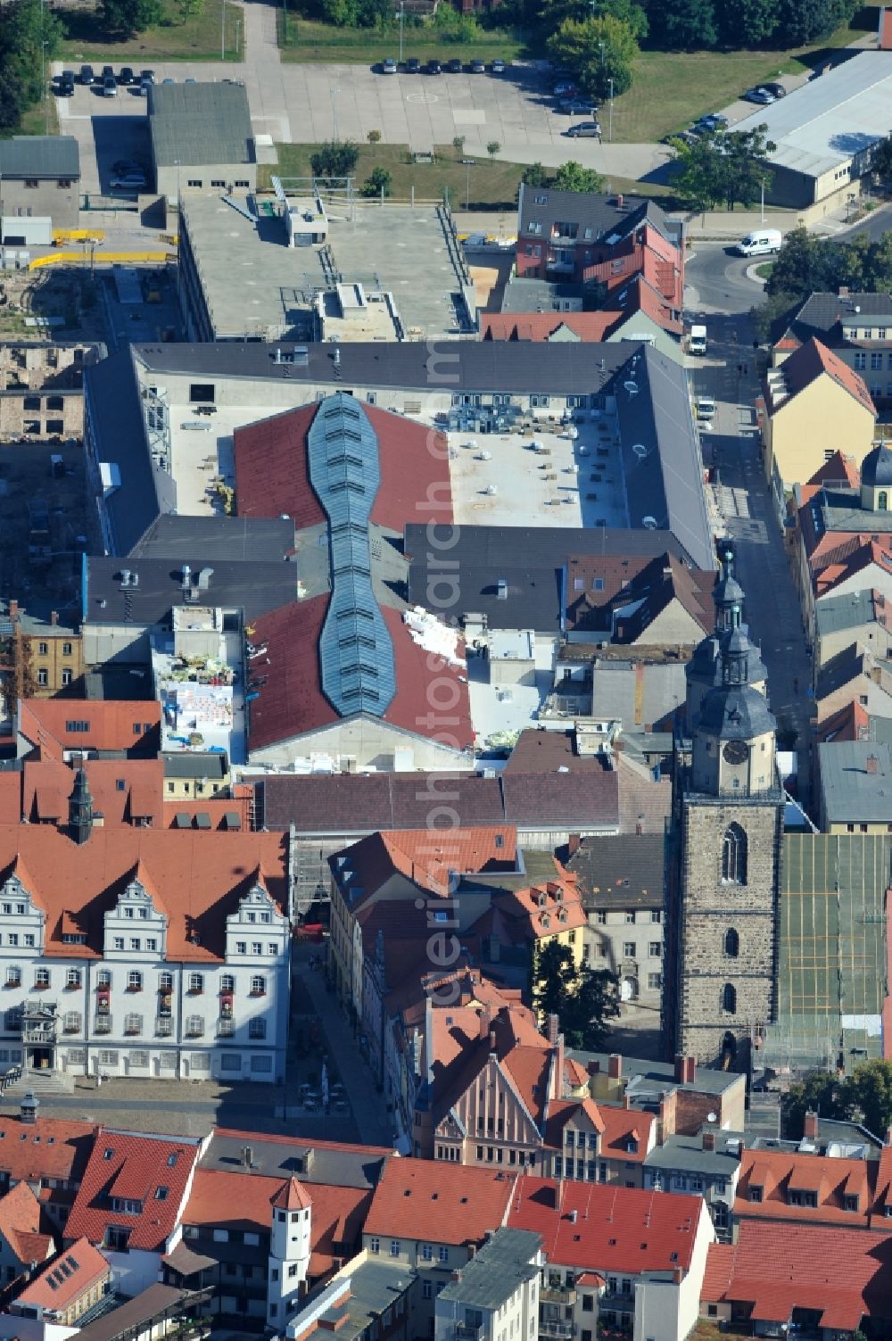 Wittenberg from above - View of the construction site of the shopping center Arsenal between the Arsenal square and the market place in the inner city of Wittenberg. Project developers are MIB AG and the OFB Development GmbH. The completion is scheduled for autumn 2012