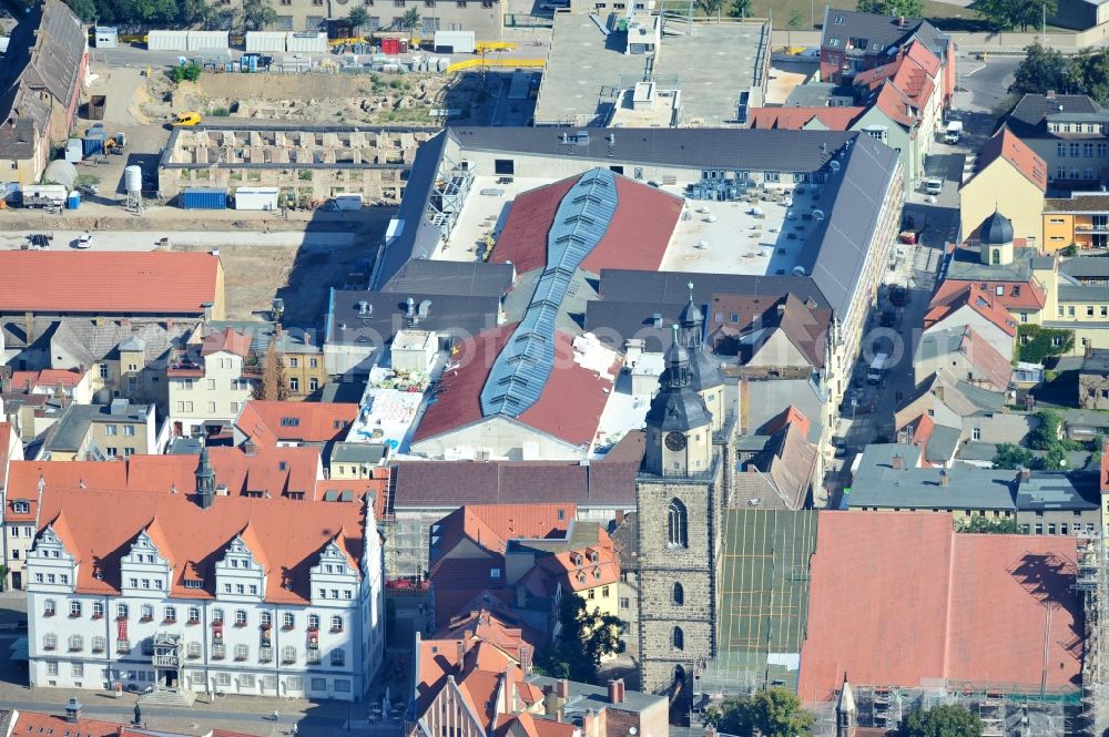 Aerial image Wittenberg - View of the construction site of the shopping center Arsenal between the Arsenal square and the market place in the inner city of Wittenberg. Project developers are MIB AG and the OFB Development GmbH. The completion is scheduled for autumn 2012