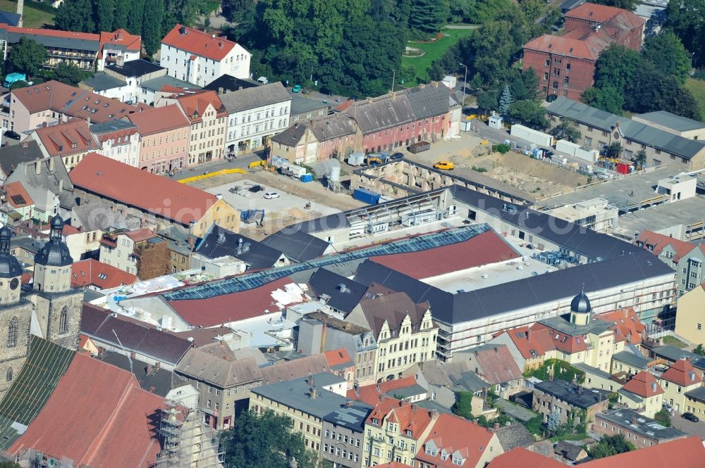 Wittenberg from above - View of the construction site of the shopping center Arsenal between the Arsenal square and the market place in the inner city of Wittenberg. Project developers are MIB AG and the OFB Development GmbH. The completion is scheduled for autumn 2012