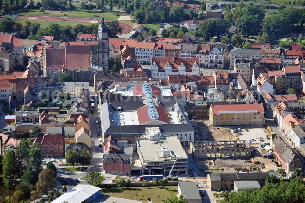 Wittenberg from above - View of the construction site of the shopping center Arsenal between the Arsenal square and the market place in the inner city of Wittenberg. Project developers are MIB AG and the OFB Development GmbH. The completion is scheduled for autumn 2012