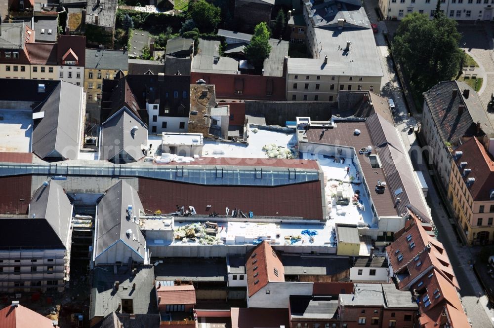 Aerial image Wittenberg - View of the construction site of the shopping center Arsenal between the Arsenal square and the market place in the inner city of Wittenberg. Project developers are MIB AG and the OFB Development GmbH. The completion is scheduled for autumn 2012