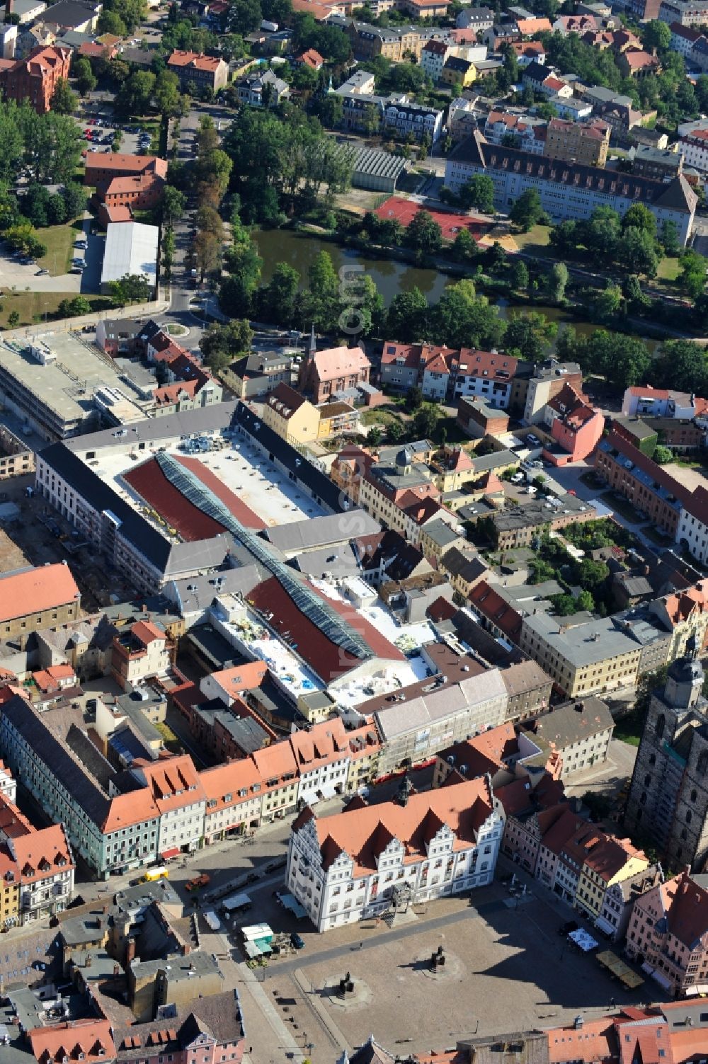 Wittenberg from above - View of the construction site of the shopping center Arsenal between the Arsenal square and the market place in the inner city of Wittenberg. Project developers are MIB AG and the OFB Development GmbH. The completion is scheduled for autumn 2012