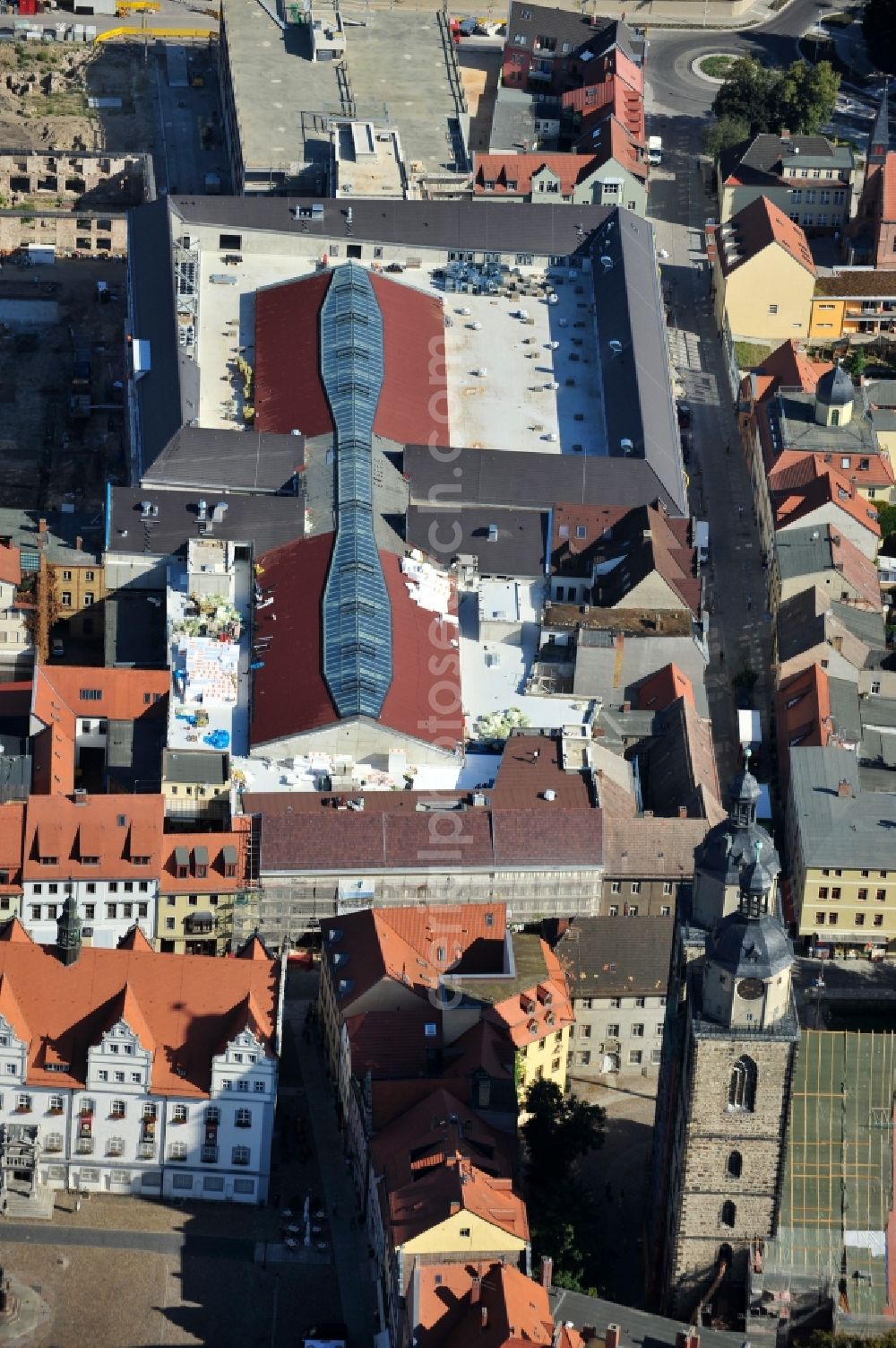 Aerial image Wittenberg - View of the construction site of the shopping center Arsenal between the Arsenal square and the market place in the inner city of Wittenberg. Project developers are MIB AG and the OFB Development GmbH. The completion is scheduled for autumn 2012