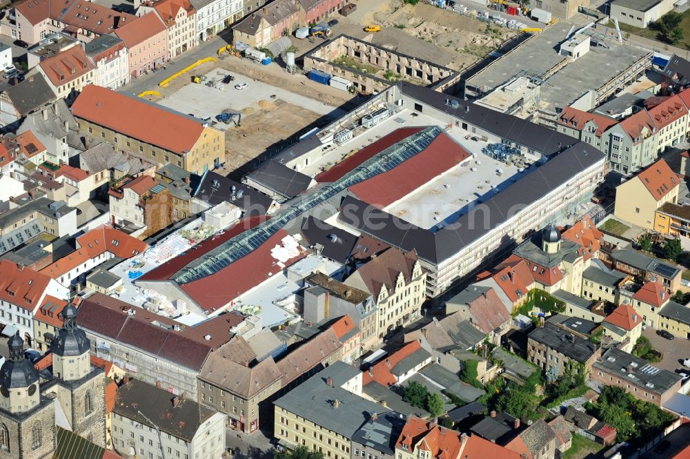 Aerial image Wittenberg - View of the construction site of the shopping center Arsenal between the Arsenal square and the market place in the inner city of Wittenberg. Project developers are MIB AG and the OFB Development GmbH. The completion is scheduled for autumn 2012