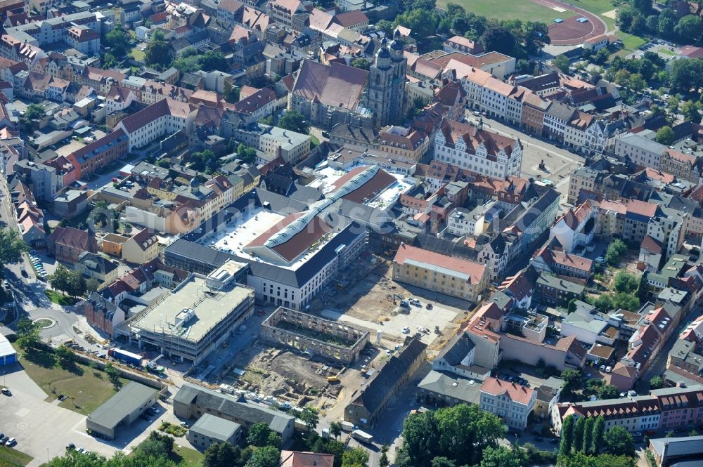 Wittenberg from the bird's eye view: View of the construction site of the shopping center Arsenal between the Arsenal square and the market place in the inner city of Wittenberg. Project developers are MIB AG and the OFB Development GmbH. The completion is scheduled for autumn 2012