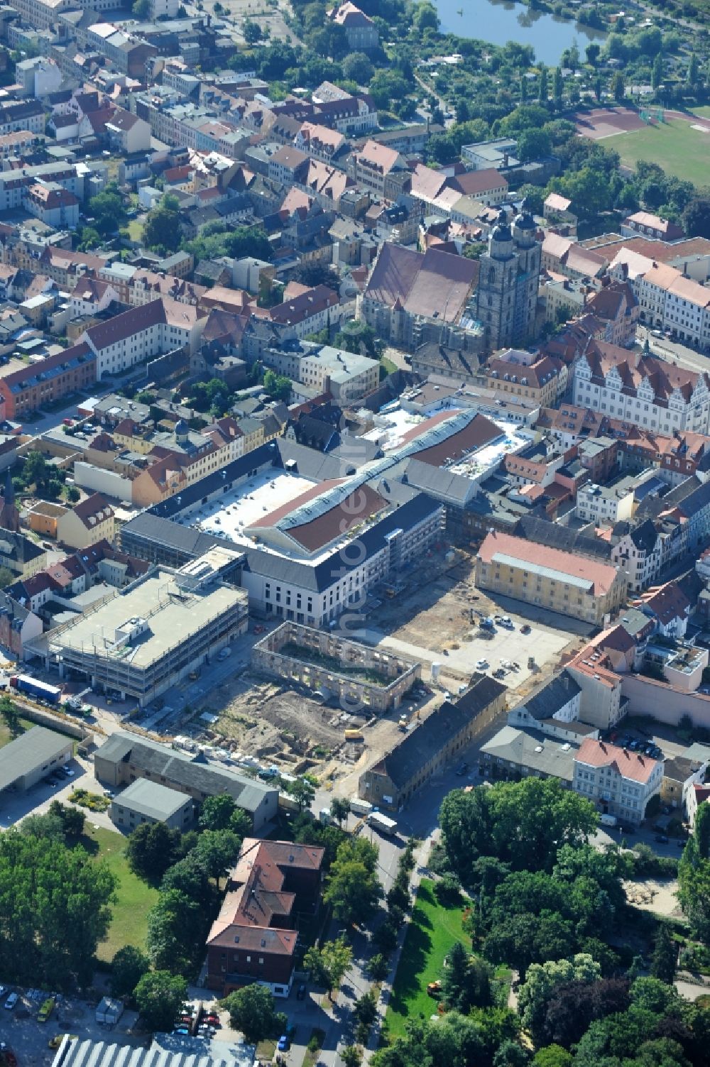 Aerial image Wittenberg - View of the construction site of the shopping center Arsenal between the Arsenal square and the market place in the inner city of Wittenberg. Project developers are MIB AG and the OFB Development GmbH. The completion is scheduled for autumn 2012