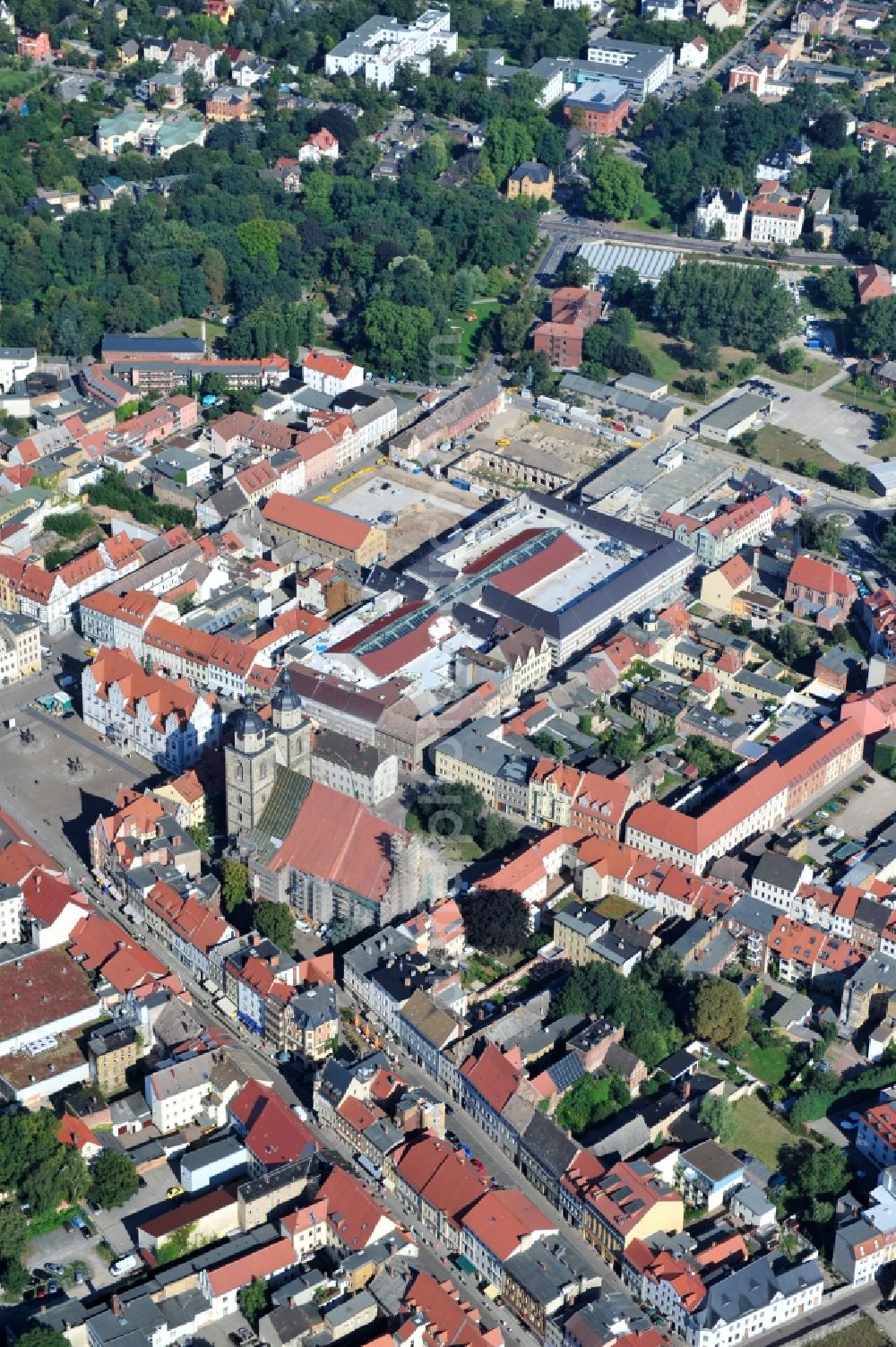 Wittenberg from above - View of the construction site of the shopping center Arsenal between the Arsenal square and the market place in the inner city of Wittenberg. Project developers are MIB AG and the OFB Development GmbH. The completion is scheduled for autumn 2012