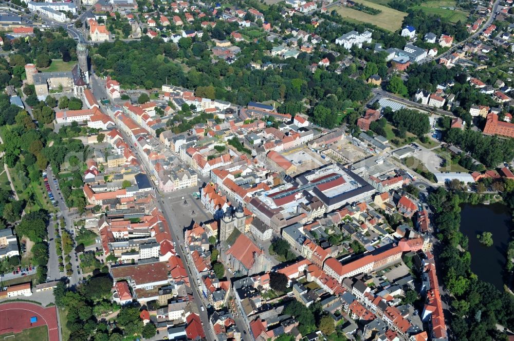 Wittenberg from the bird's eye view: View of the construction site of the shopping center Arsenal between the Arsenal square and the market place in the inner city of Wittenberg. Project developers are MIB AG and the OFB Development GmbH. The completion is scheduled for autumn 2012