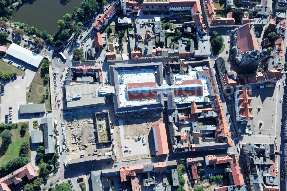 Wittenberg from above - View of the construction site of the shopping center Arsenal between the Arsenal square and the market place in the inner city of Wittenberg. Project developers are MIB AG and the OFB Development GmbH. The completion is scheduled for autumn 2012