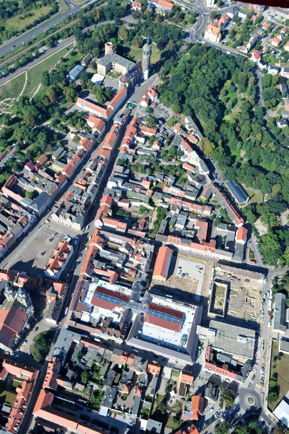 Aerial image Wittenberg - View of the construction site of the shopping center Arsenal between the Arsenal square and the market place in the inner city of Wittenberg. Project developers are MIB AG and the OFB Development GmbH. The completion is scheduled for autumn 2012