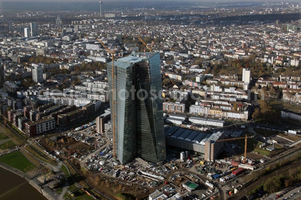 Frankfurt am Main from above - View of the construction site of the new headquarters of the European Central Bank (ECB) in Ostend. The listed market hall will be renovated and houses later the public areas of the Central Bank. The new headquarters will be completed in 2014 and was designed by the Viennese architects Coop Himmelb(L)AU