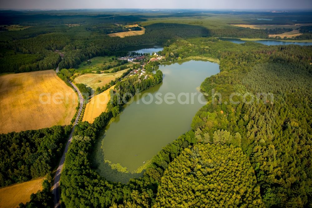 Wokuhl-Dabelow from above - Lake Grosser Gadowsee in the lake district of Mecklenburger Seenlandschaft in Wokuhl-Dabelow in the state of Mecklenburg - Western Pomerania. The lake is surrounded by forest and fields and located South of Lake Kleiner Gadowsee