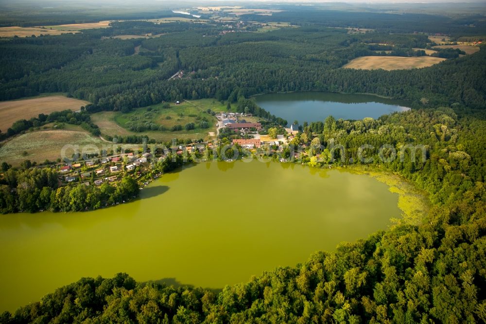 Wokuhl-Dabelow from the bird's eye view: Lake Grosser Gadowsee in the lake district of Mecklenburger Seenlandschaft in Wokuhl-Dabelow in the state of Mecklenburg - Western Pomerania. The lake is surrounded by forest and fields and located South of Lake Kleiner Gadowsee