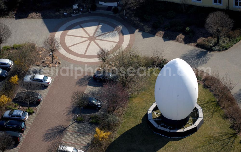 Aerial photograph Niemegk OT Neuendorf - Blick auf ein grosses Osterei welches zur Osterzeit vor dem GreenLine Landhotel Im Fläming steht und in den Abendstunden leuchtet. Kontakt: Zum Reiterhof 1, 14823 Niemegk OT Neuendorf, Tel. +49(0)33843 92719 0, Fax +49(0)33843 92719 999, e-mail: info@landhotel-im-flaeming.de