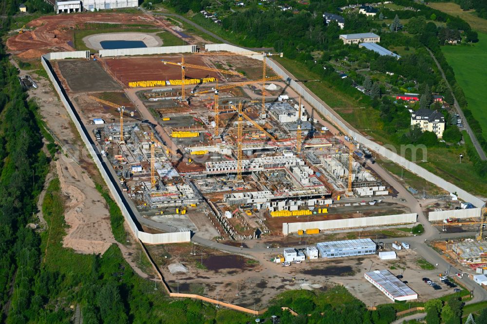 Zwickau from above - Construction site for the new construction of the large prison area and security fencing of the future correctional facility JVA on street Buelaustrasse in the district Marienthal in Zwickau in the state Saxony, Germany